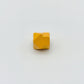 Arrow artisan keycap golden yellow zinc alloy lacquer finish three quarter angle view