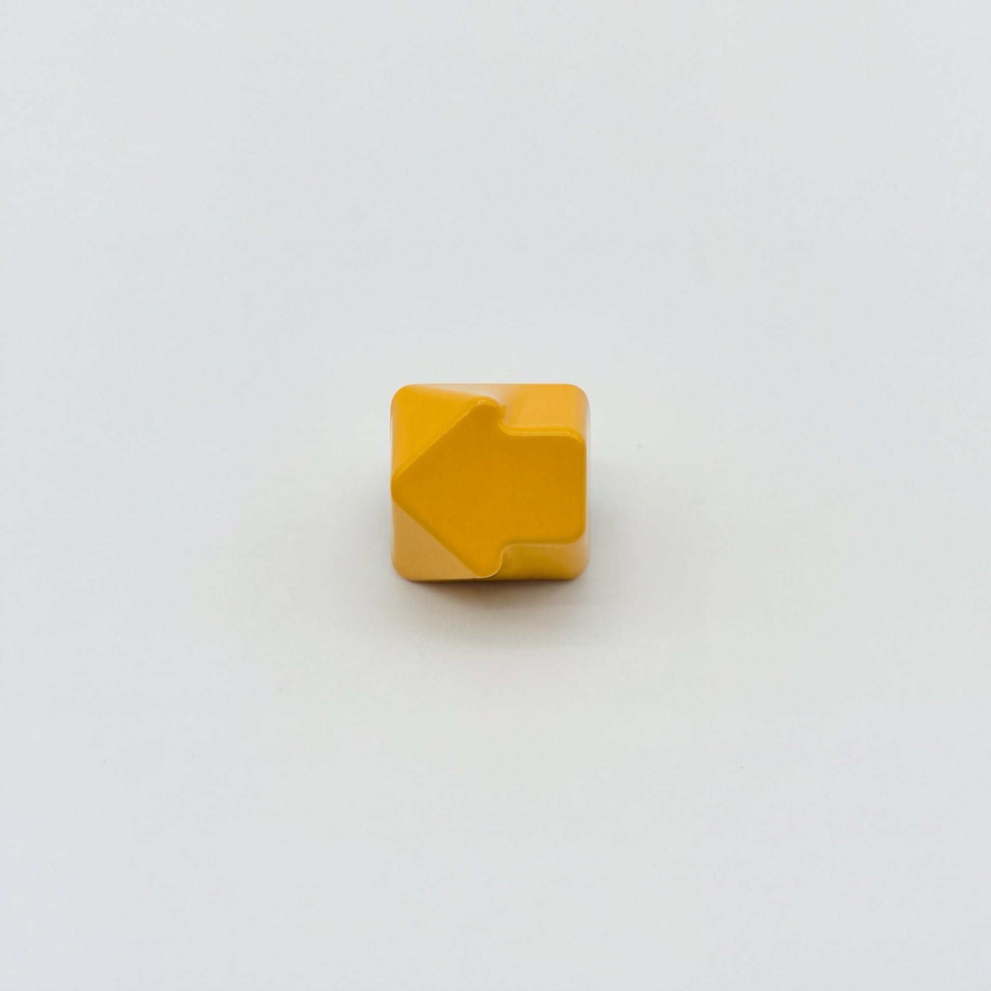 Arrow artisan keycap golden yellow zinc alloy lacquer finish three quarter angle view