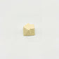 Sculpted arrow custom keycap cream white die-cast metal smooth lacquer top view on white background