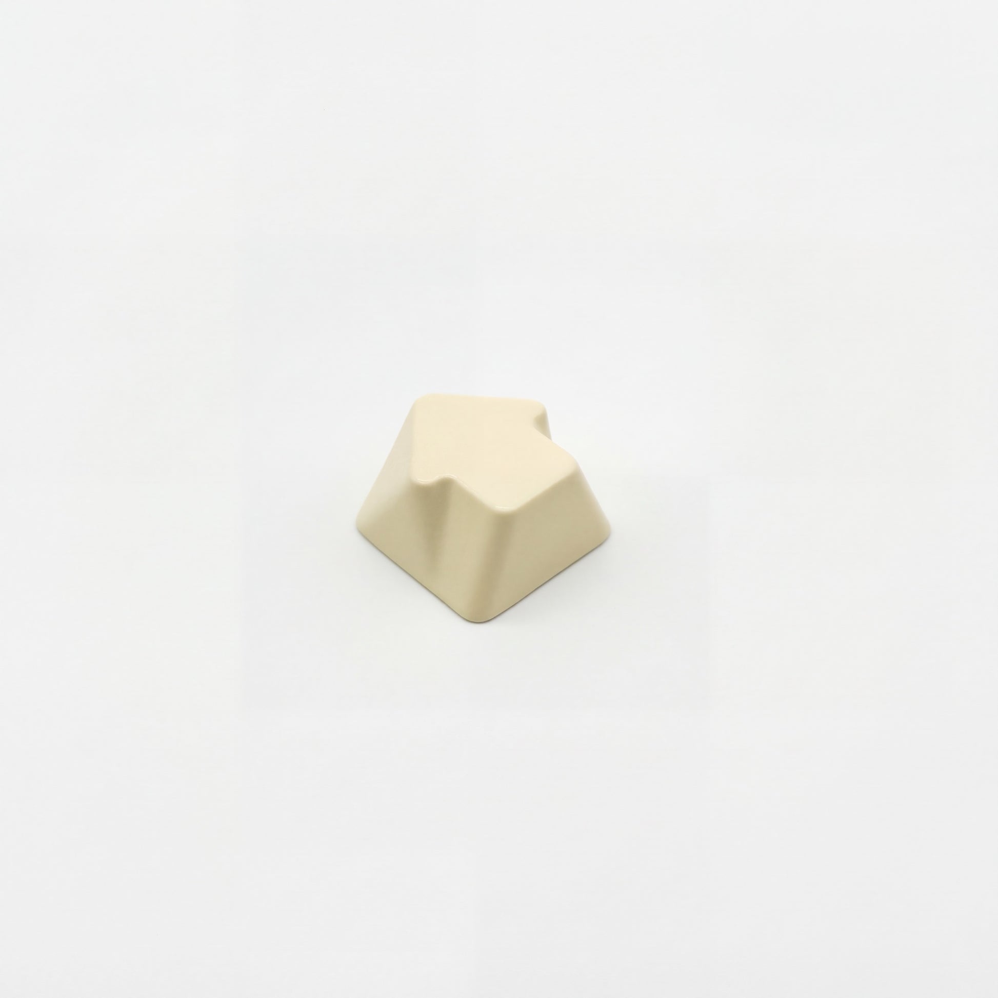 Arrow novelty keycap cream white side profile showing 3D relief sculpted arrow zinc alloy