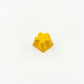 Asterisk novelty keycap yellow side view showing 3D sculpted six lobe relief zinc alloy high gloss