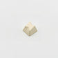 Minimalist bolt novelty keycap cream white side view showing 3D faceted lightning relief zinc alloy