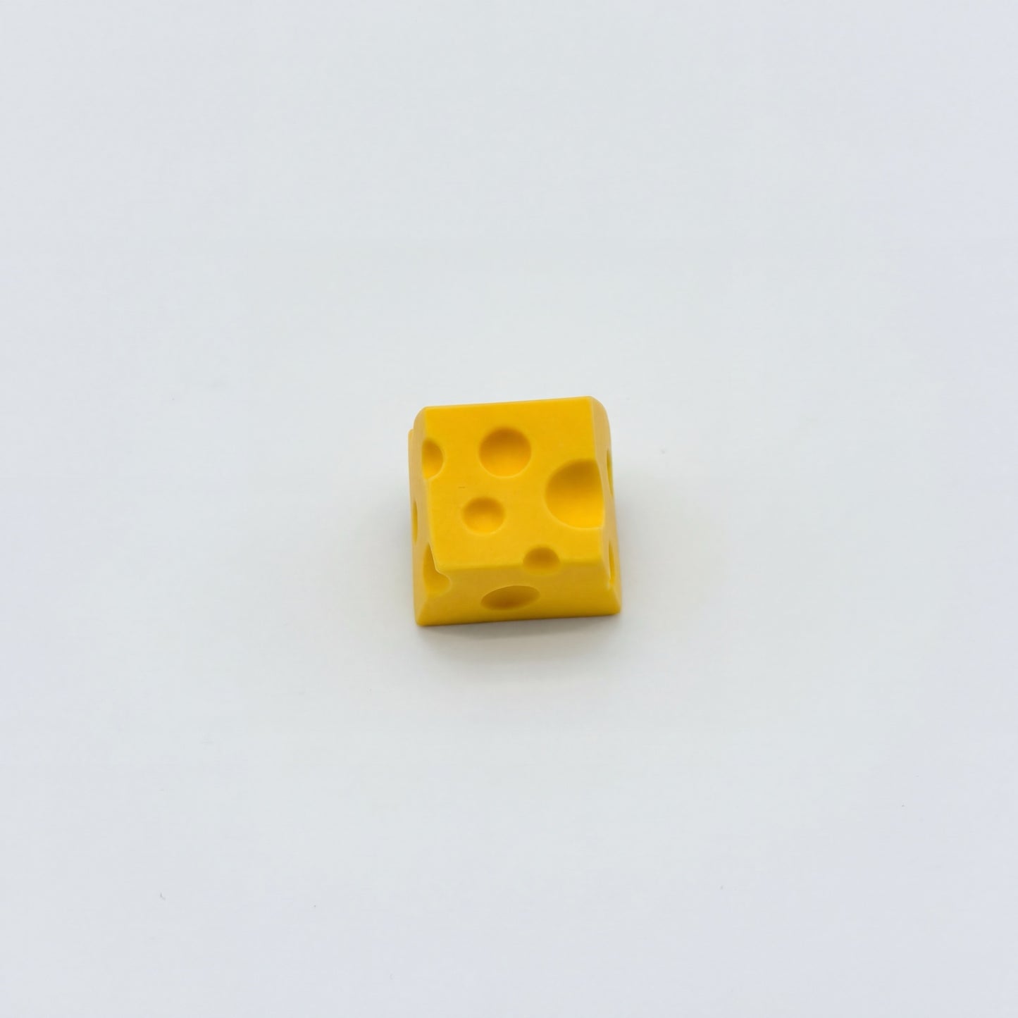 Cute cheese novelty keycap yellow matte finish three quarter angle view