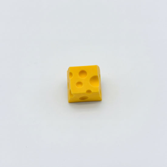 Cute cheese novelty keycap yellow matte finish three quarter angle view
