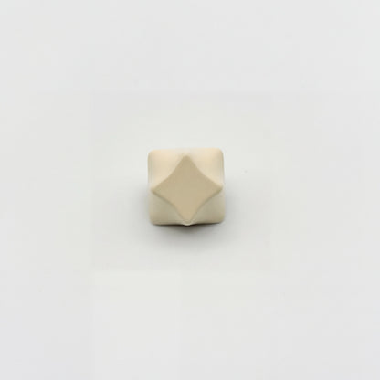 Four-point star artisan keycap cream white zinc alloy sculpted 3D relief angle view