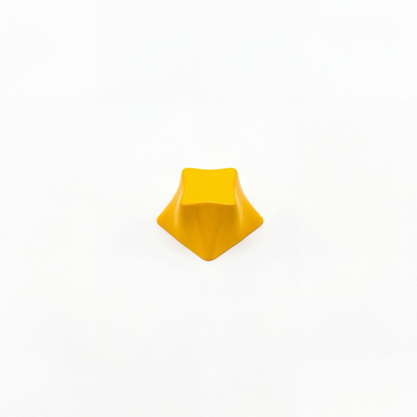 Geometric star novelty keycap golden yellow side view showing four-point star profile zinc alloy