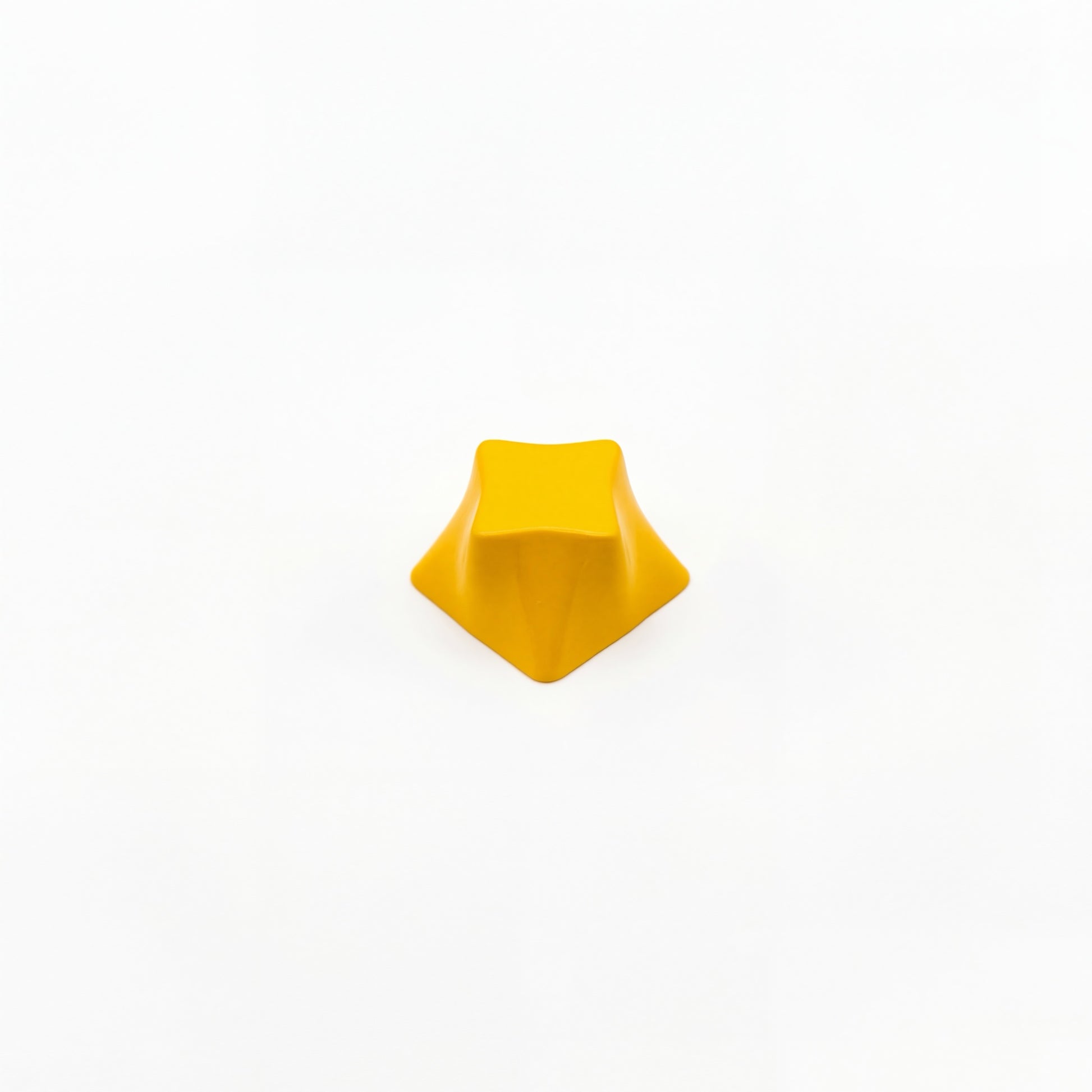 Geometric star novelty keycap golden yellow side view showing four-point star profile zinc alloy