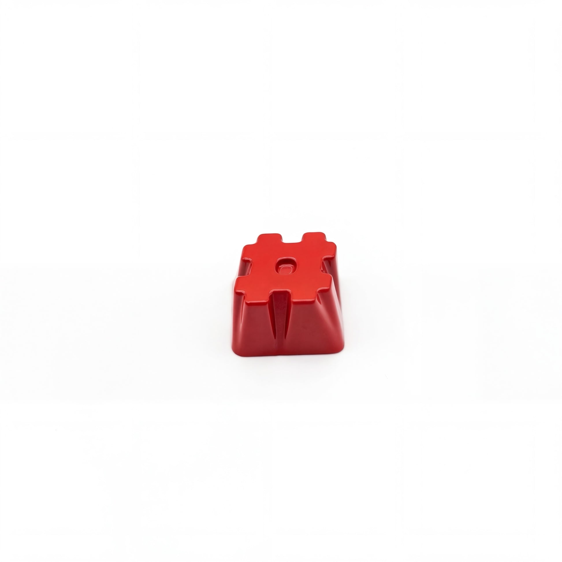Sculpted hash custom keycap red die-cast metal high gloss finish front view on white background
