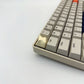 Lightning bolt keycap cream white installed on ESC key mechanical keyboard side view