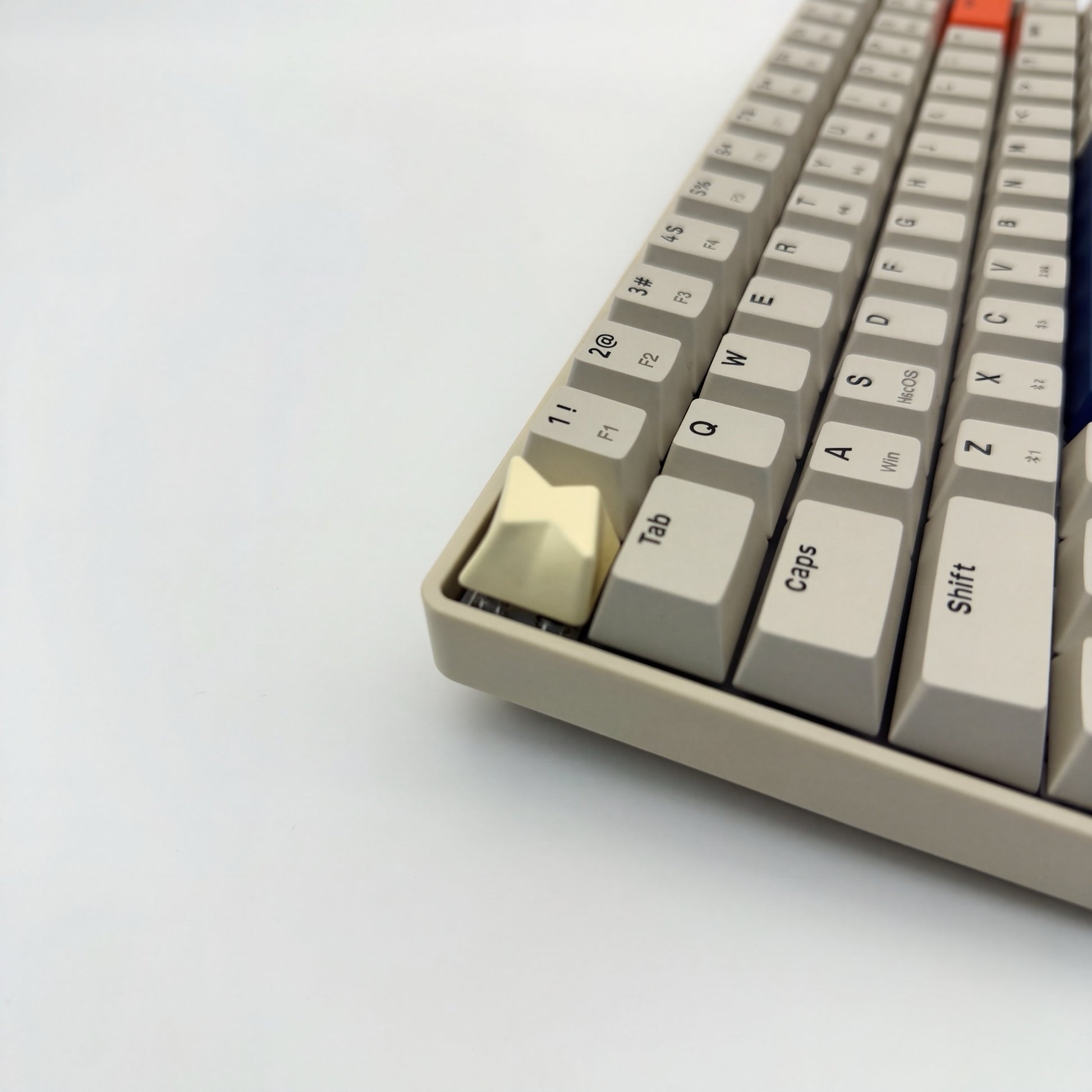 Lightning bolt keycap cream white installed on ESC key mechanical keyboard side view