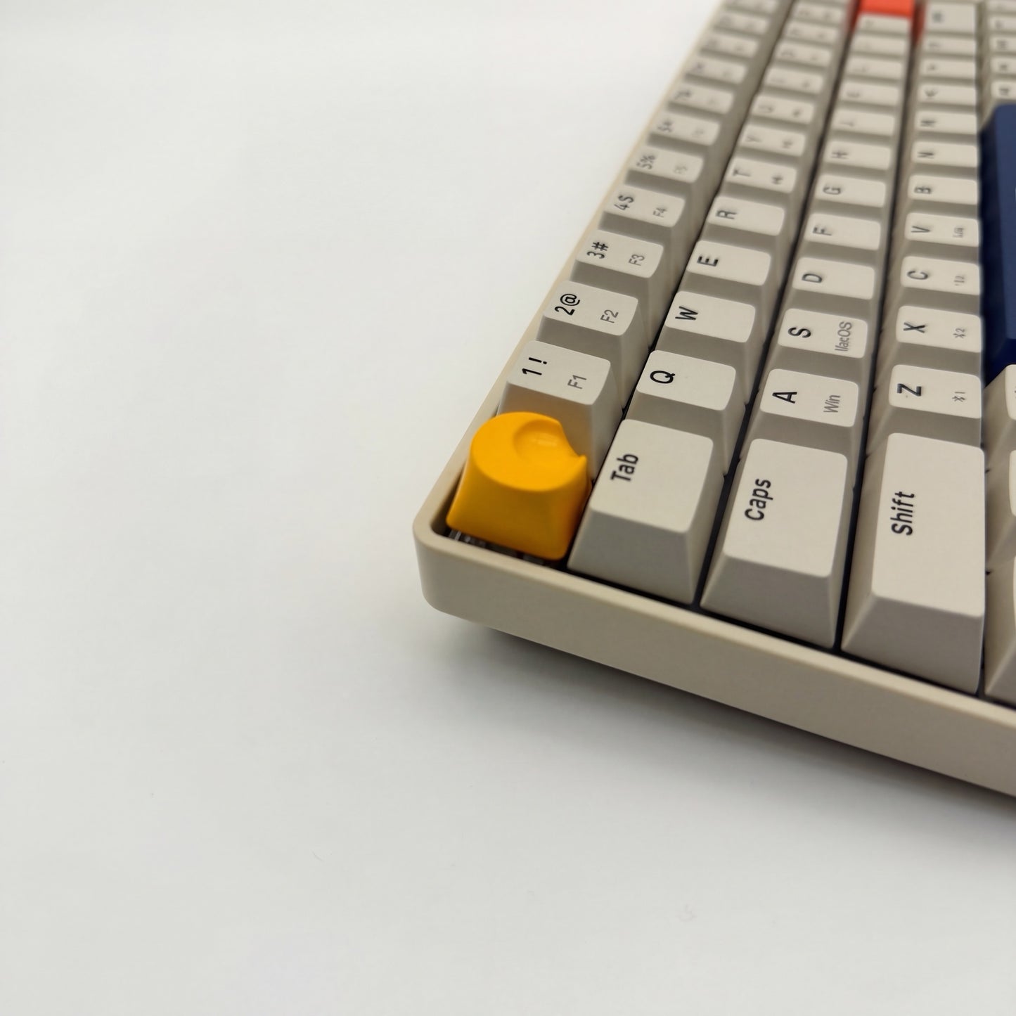Lunar artisan keycap golden yellow on mechanical keyboard side view sculpted moon detail