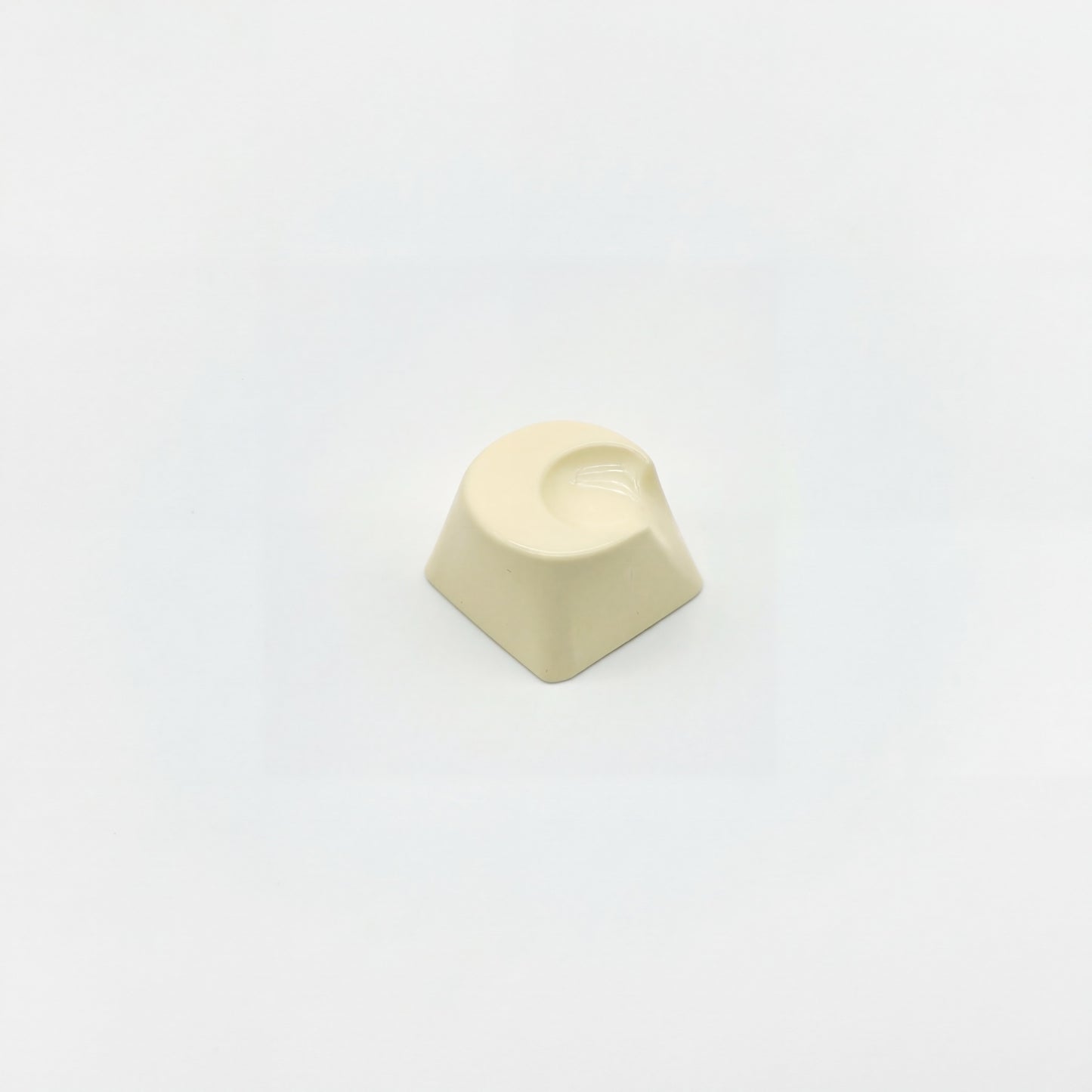 Lunar novelty keycap cream white side view showing 3D crescent moon relief and high gloss surface
