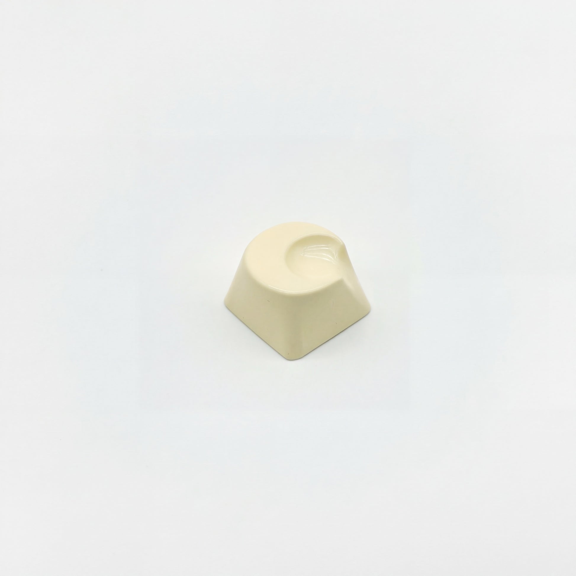 Lunar novelty keycap cream white side view showing 3D crescent moon relief and high gloss surface