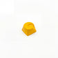 Lunar novelty keycap golden yellow side view showing 3D crescent moon relief and smooth surface