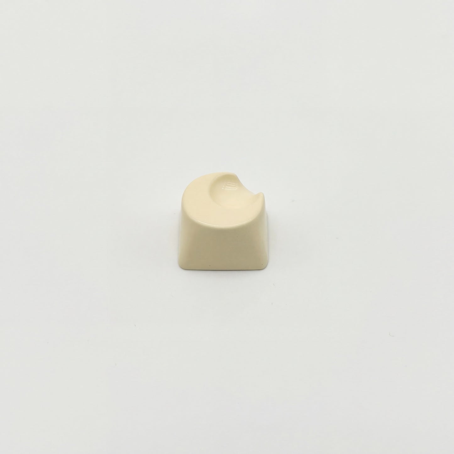 Sculpted moon custom keycap cream white smooth high gloss finish front view on white background