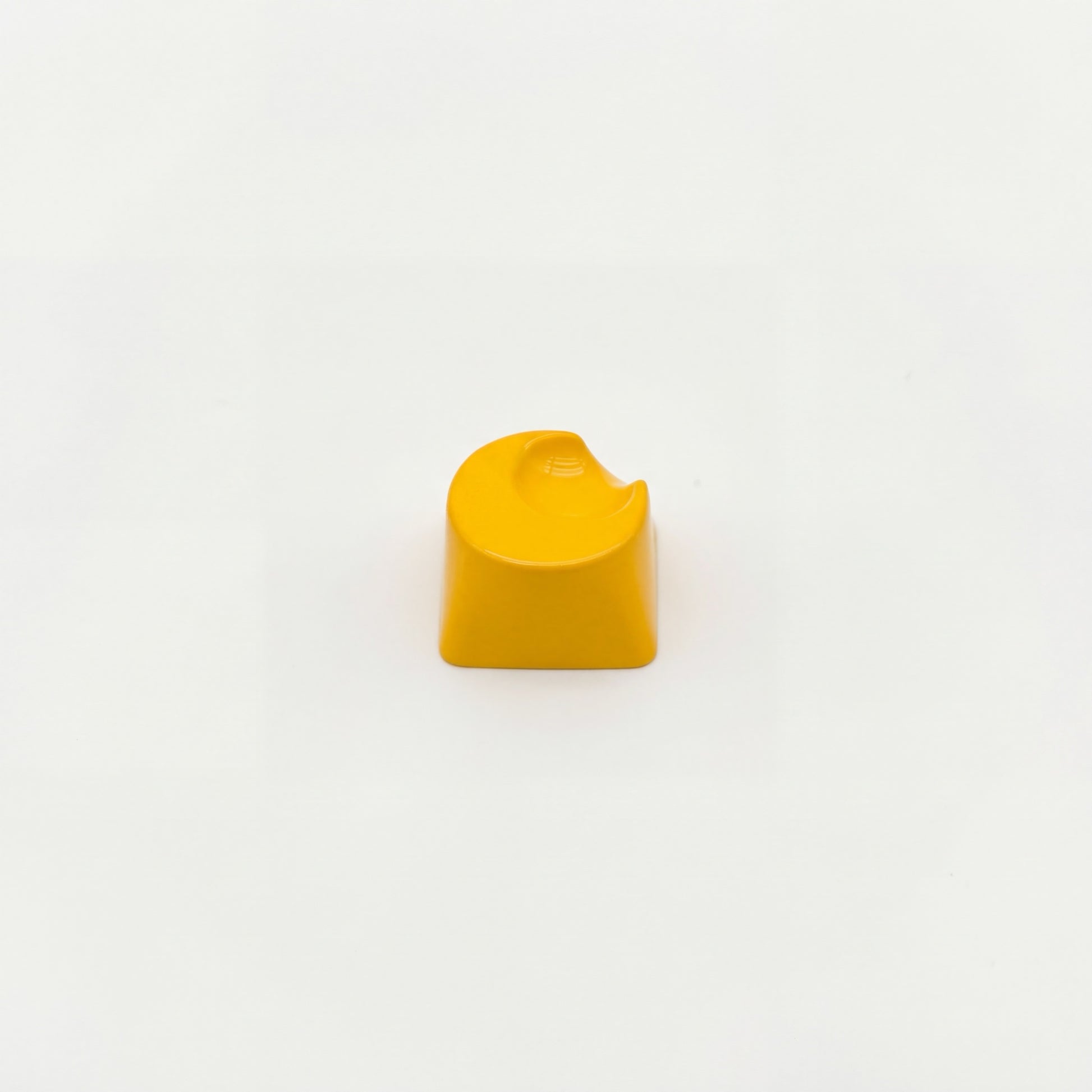 Sculpted moon custom keycap golden yellow vibrant high gloss finish front view on white background