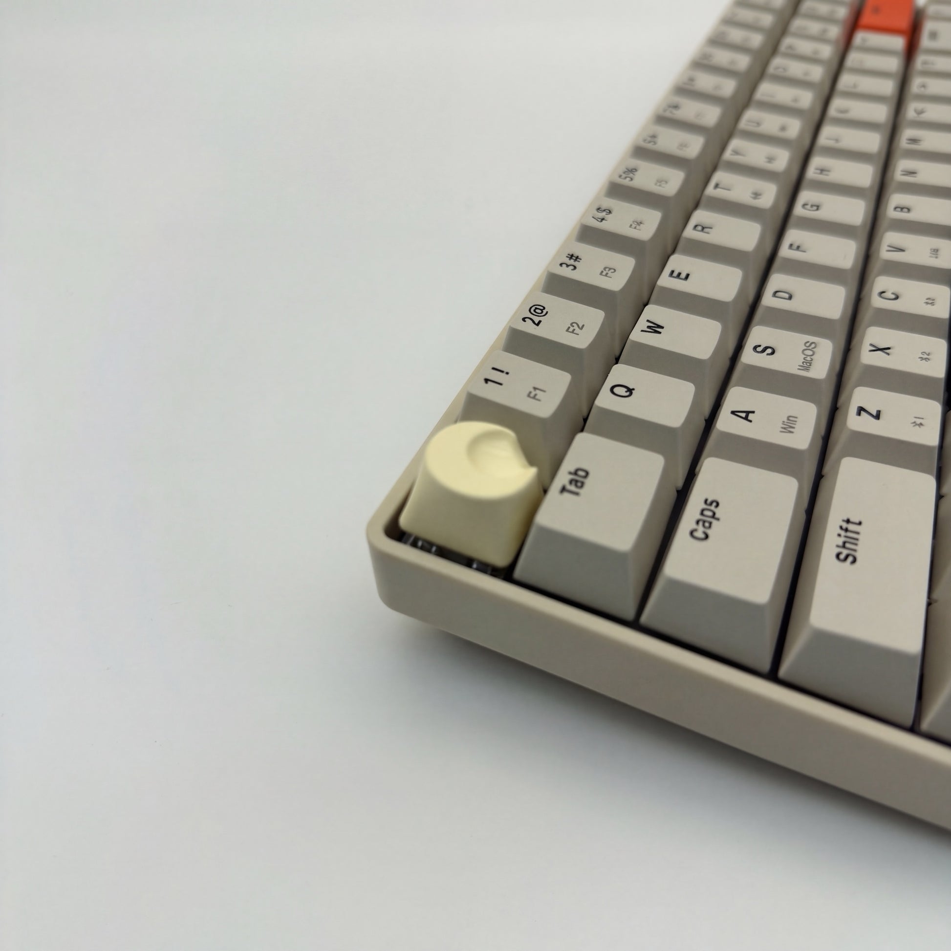 Cute moon keycap cream white on mechanical keyboard top angle minimalist desk setup
