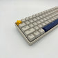 Cute yellow star artisan keycap zinc alloy on mechanical keyboard side view showing sculpted asterisk detail