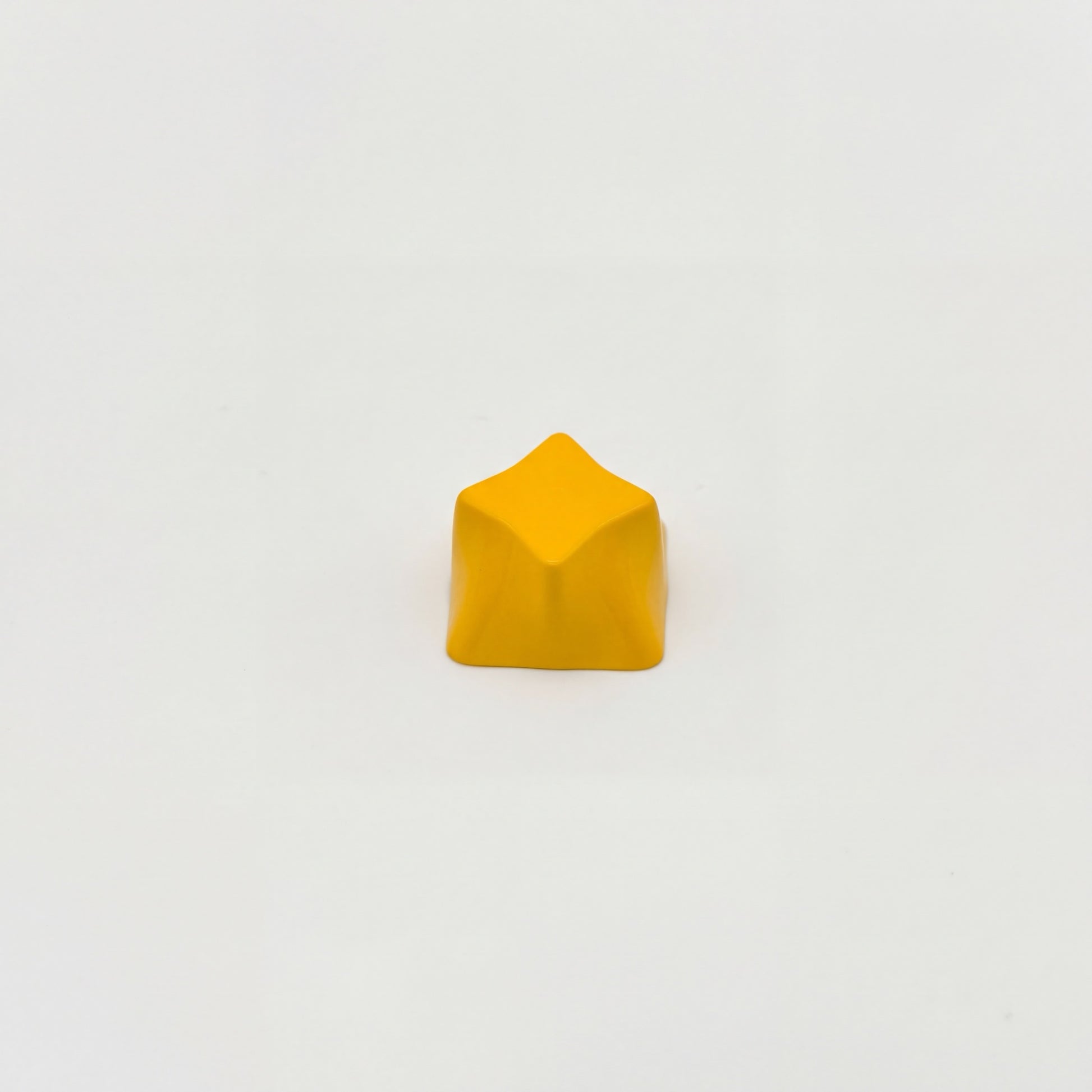 Sculpted star custom keycap golden yellow die-cast zinc alloy minimalist design front view