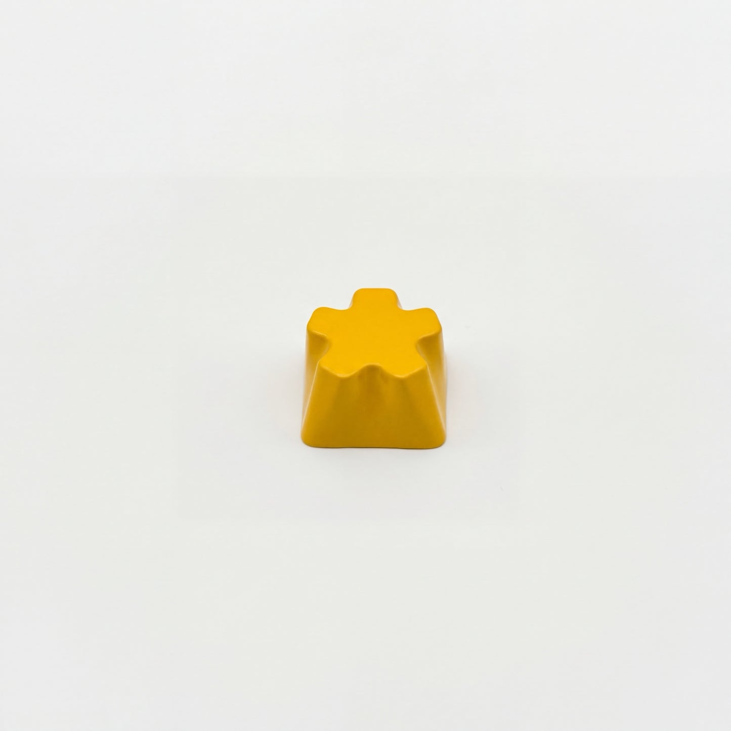 Sculpted star custom keycap yellow die-cast zinc alloy high gloss finish front view on white background