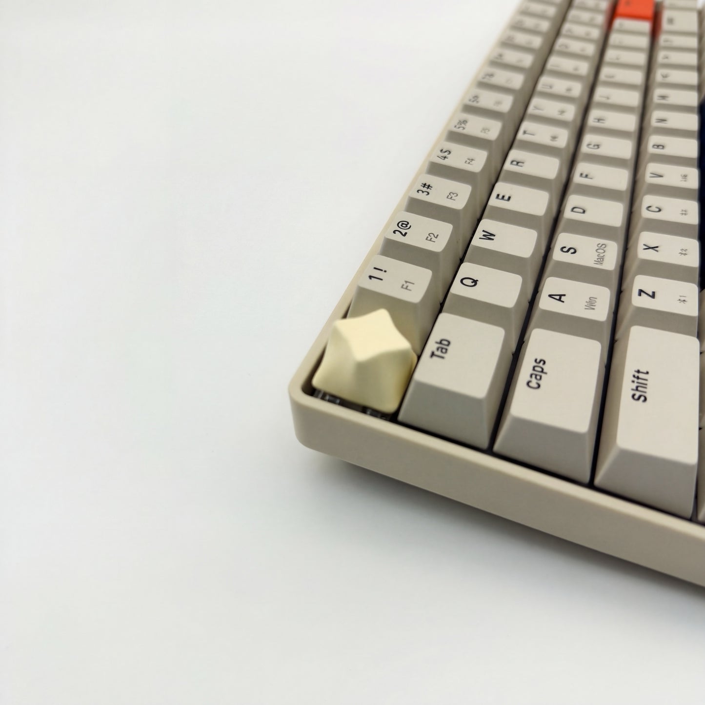 Minimalist star keycap cream white installed on ESC key mechanical keyboard side view