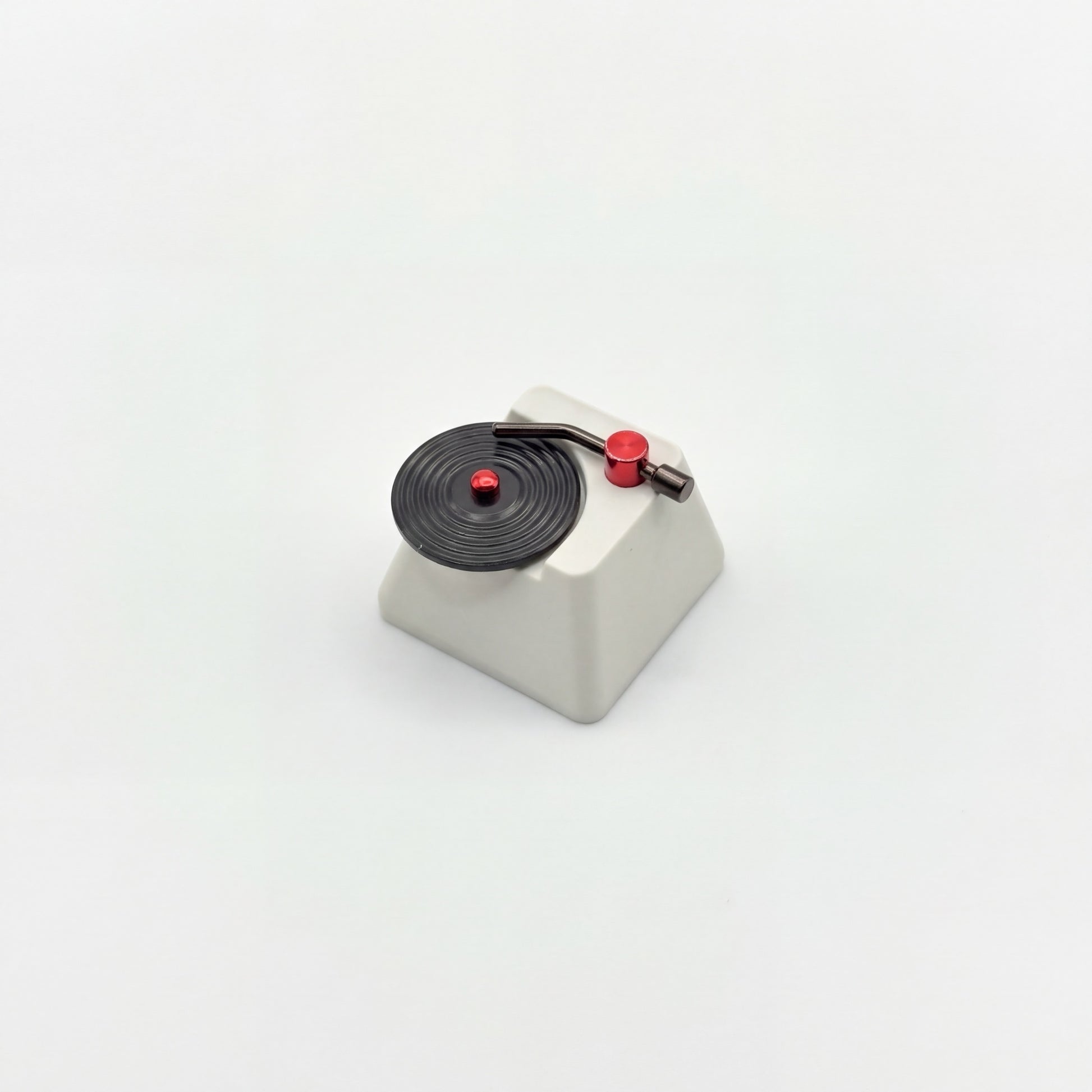 Retro turntable novelty keycap side view ABS body with black vinyl disc and red accents