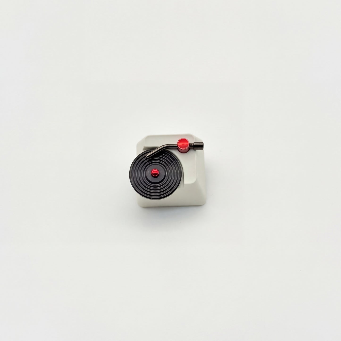 PureKeycap vinyl record player artisan keycap with spinning disc stainless steel tonearm and red accents