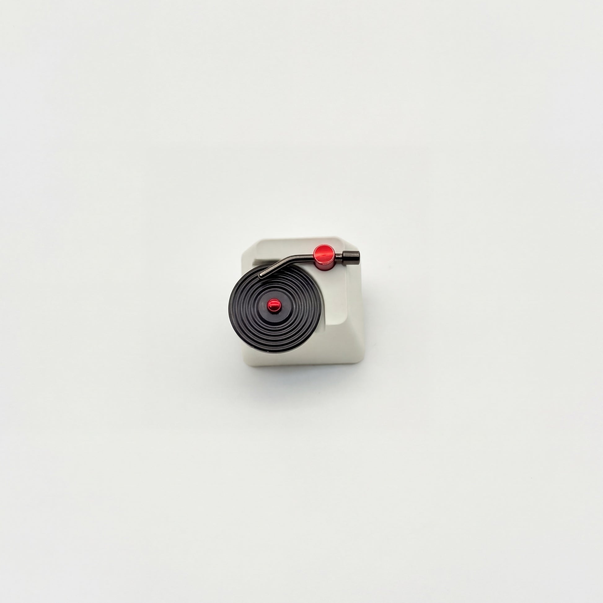 PureKeycap vinyl record player artisan keycap with spinning disc stainless steel tonearm and red accents